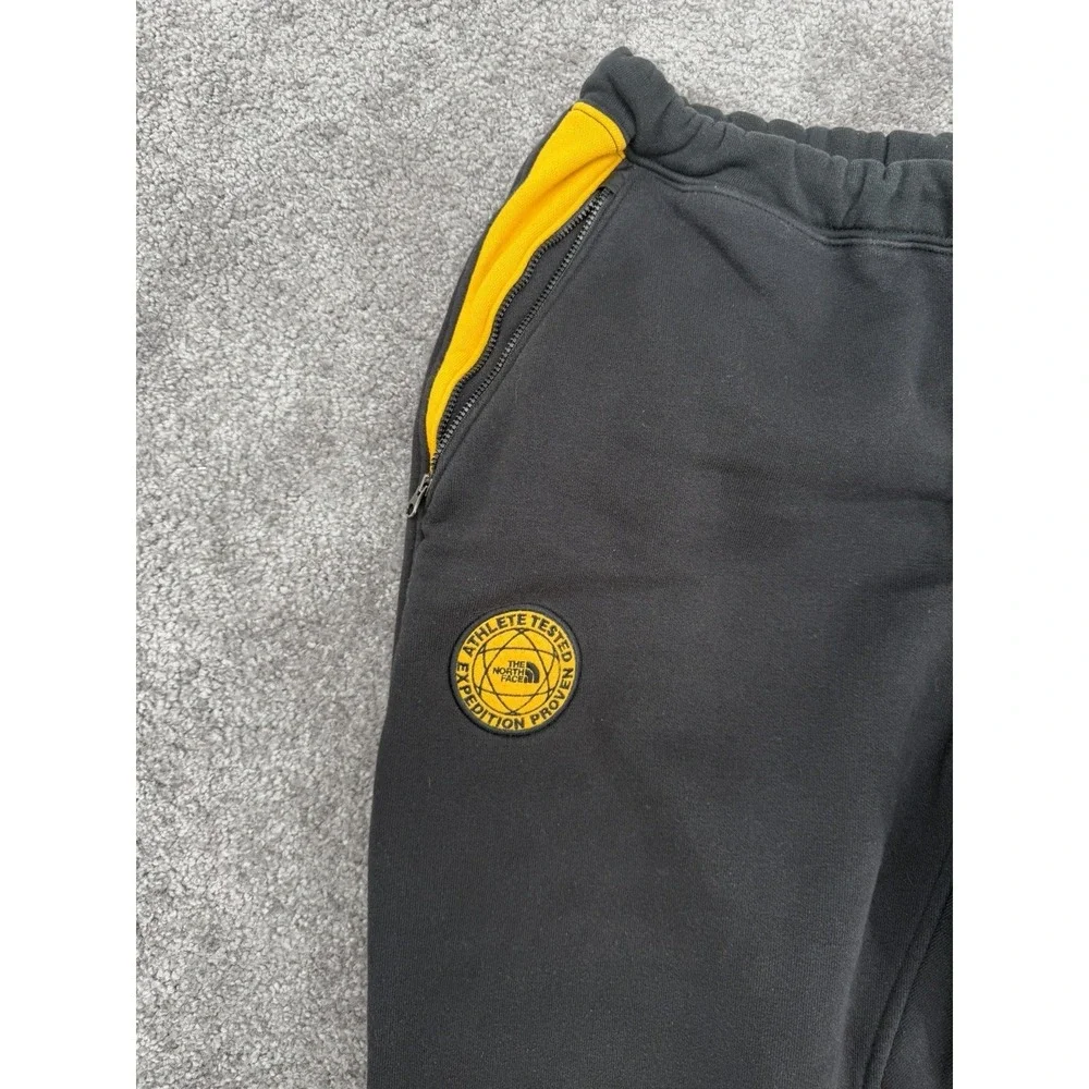 The North Face Heritage Athletics Fleece Jogger Sweatpants Men's L Black Gold